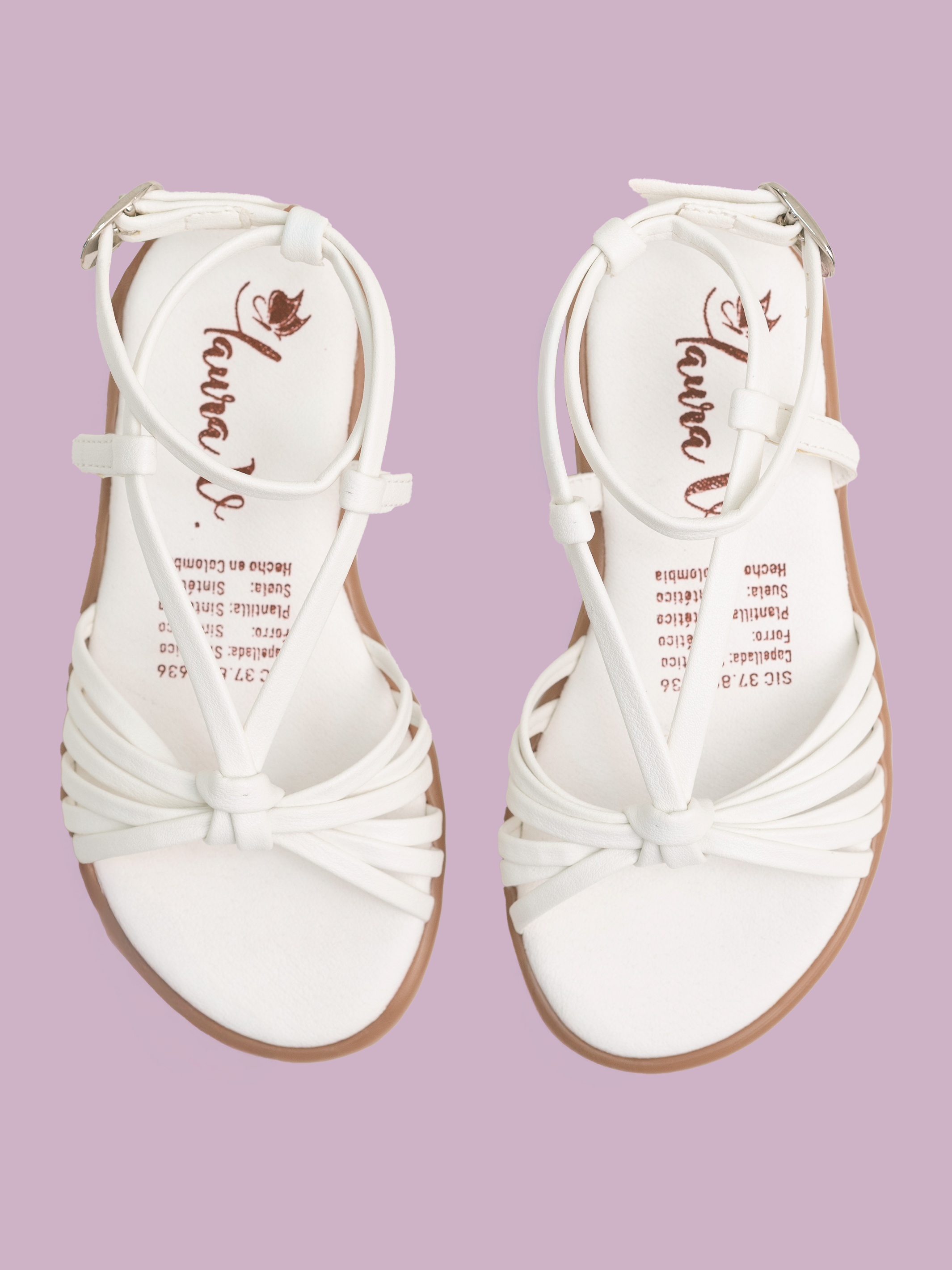 Sandalias para niñas blancas con tiras delgadas entrelazadas y nudo central