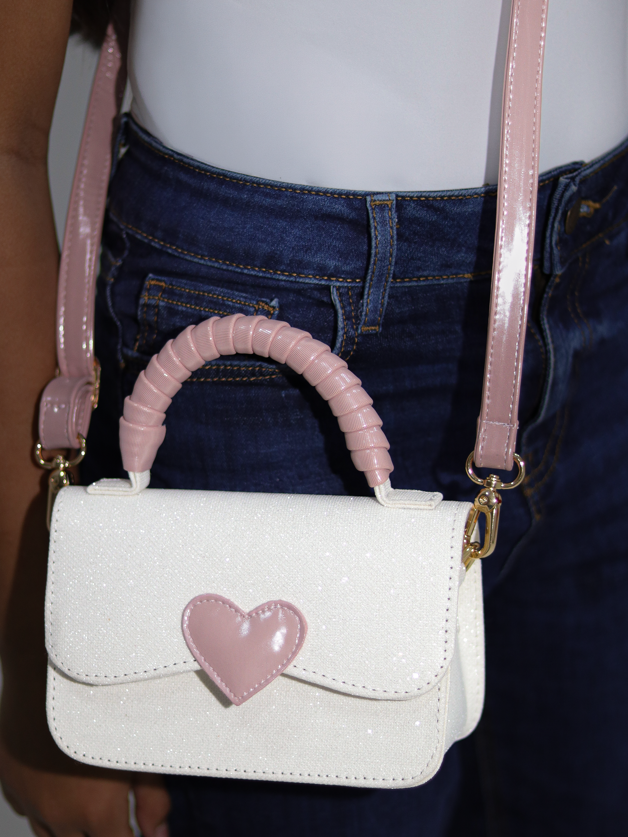 Bolsos para niñas con diseño mini bag y detalle frontal brillante